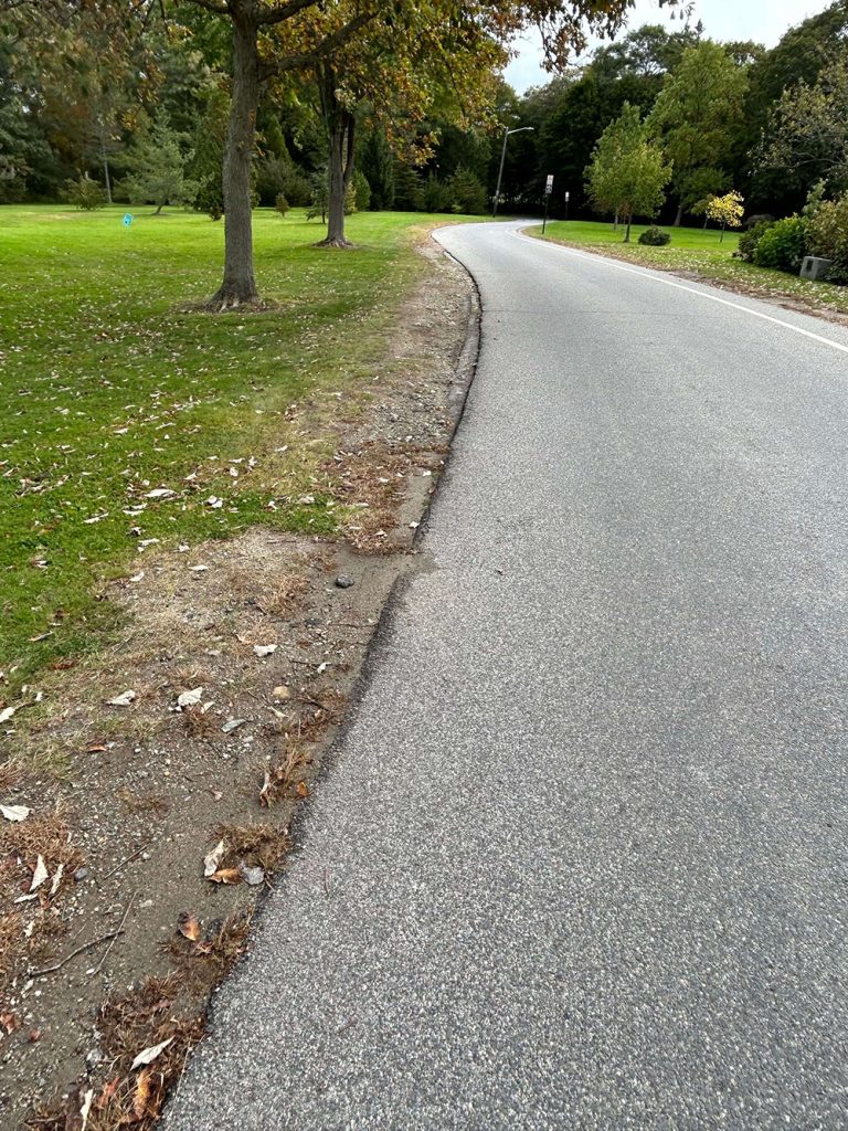 a clear road edge in payson park